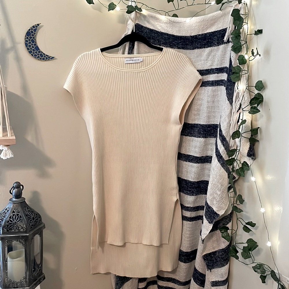 Veiled Collection Ribbed knit sweater with split hem